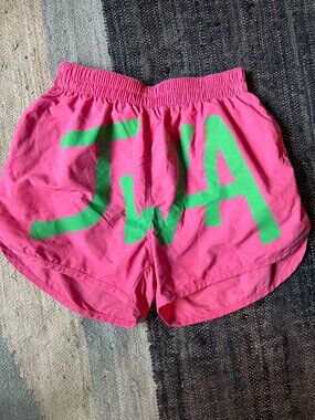 JW Anderson Logo Printed Curved Hem Swim Shorts - Pink Small (S)